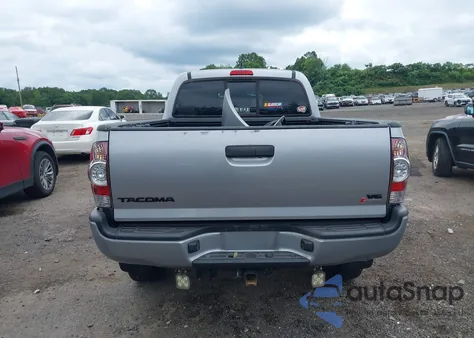 2014 Toyota Tacoma Base V6 z USA, uszkodzony, nr VIN 3TMMU4FN9EM064381